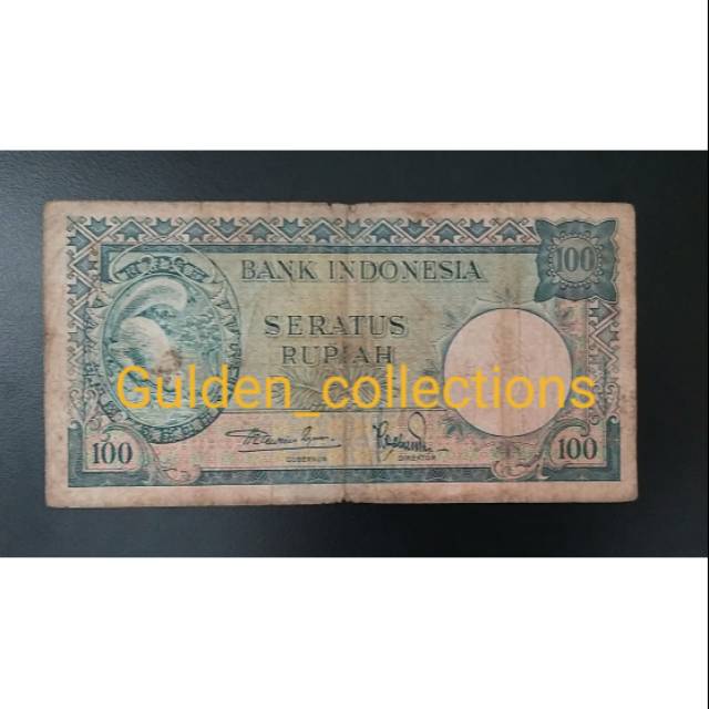 Uang kuno 100 rupiah tupai 1957 VF