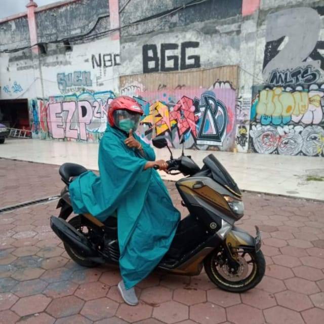 Jas hujan mantol kelelawar