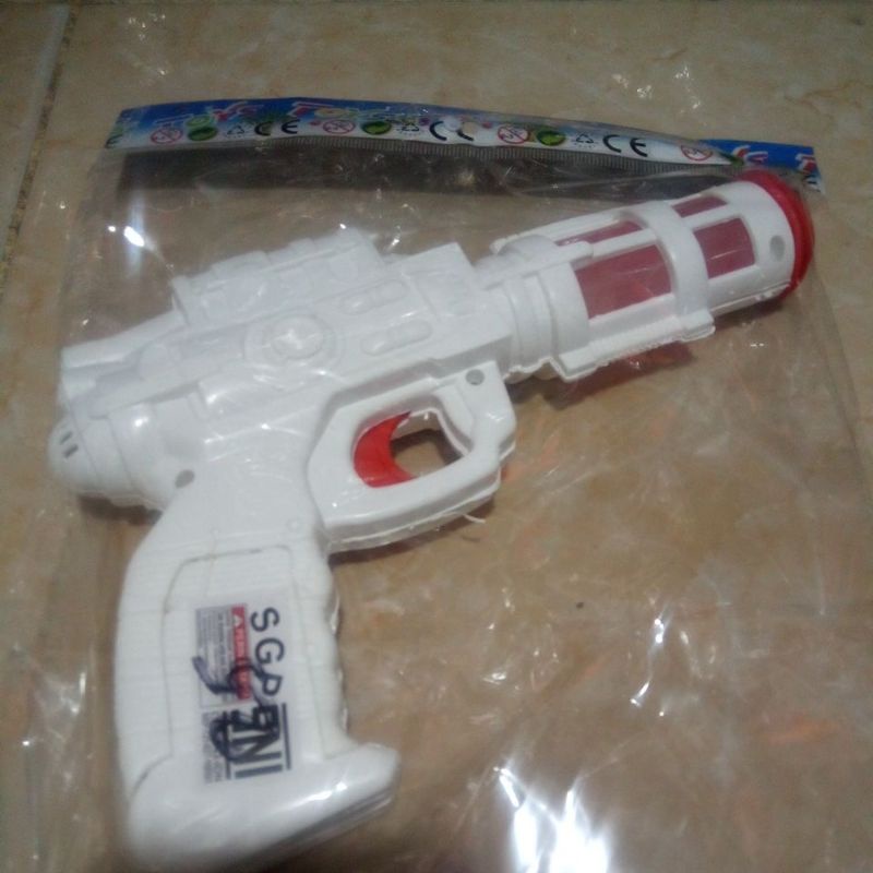 Pistol mainan anak pakai lampu dan musik