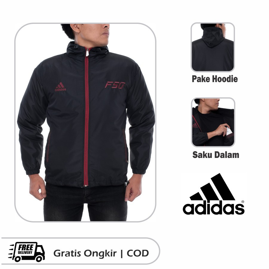 Jaket Parasut / Jaket Running Outdor Tracker F50 Hitam Strip Maroon