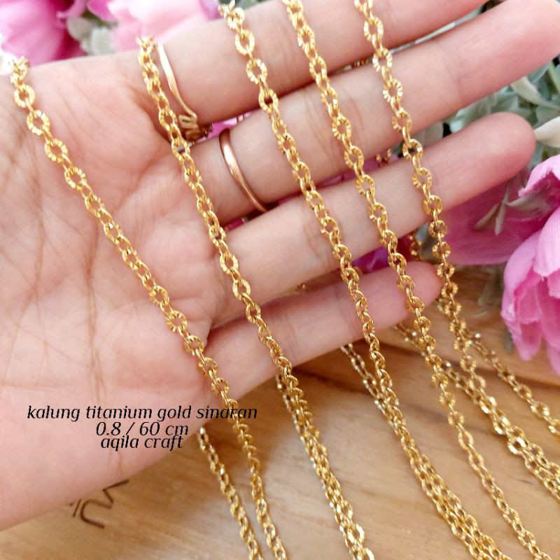 KALUNG TITANIUM SINARAN GOLD