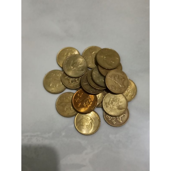 Uang koin Ro 50 Komodo