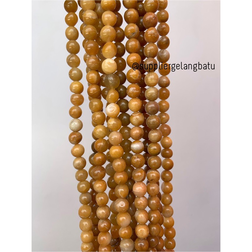 bahan batu Manigajah 10mm kuning natural polish corak retak fashion