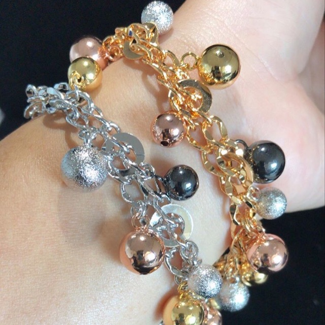 Gelang bola bola replika emas