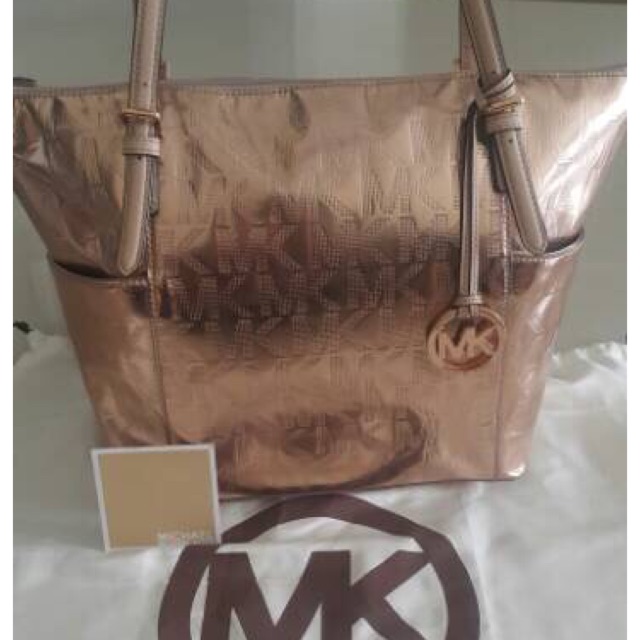 Tas MK jet set travel gold rose tote authentic