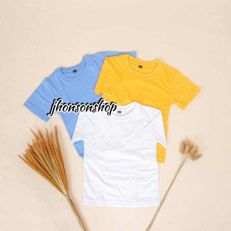 kaos oblong polos anak-anak cwe/cwo catton combat bahan adem dan enak dipakai. buat usia 2-11