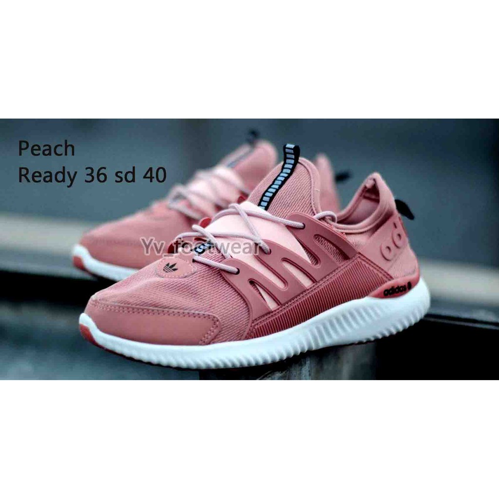 peach color adidas shoes