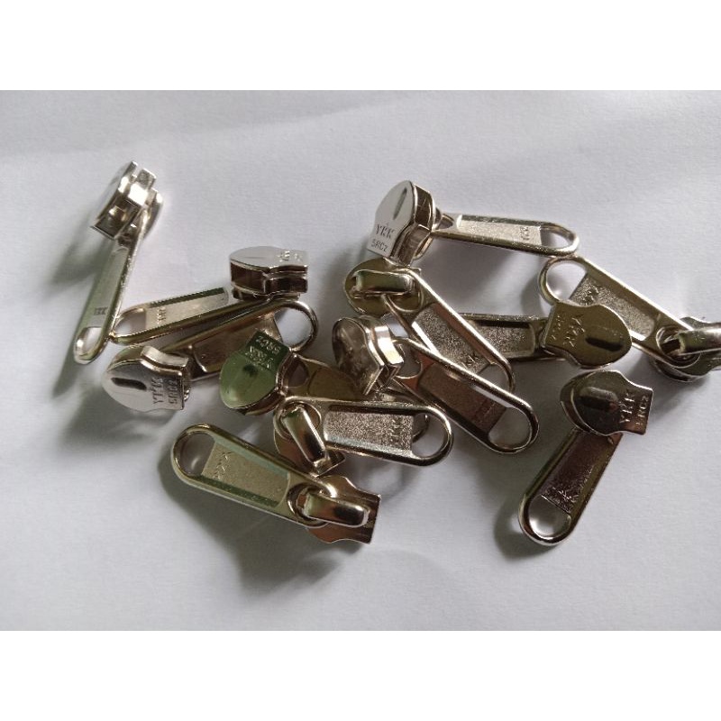 Kepala resleting YKK