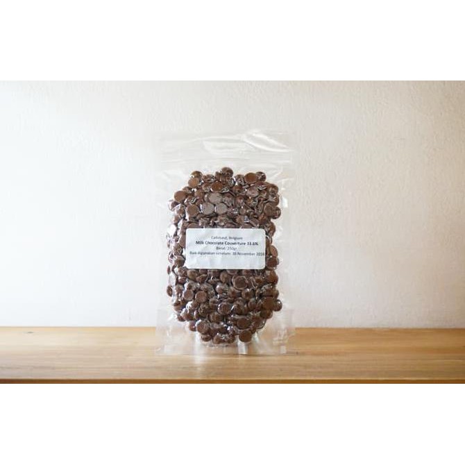 

Toko-Bahan-Kue- Cokelat Callebaut Milk Chocolate Couverture 33.6% 250G | Repack -Terlengkap-