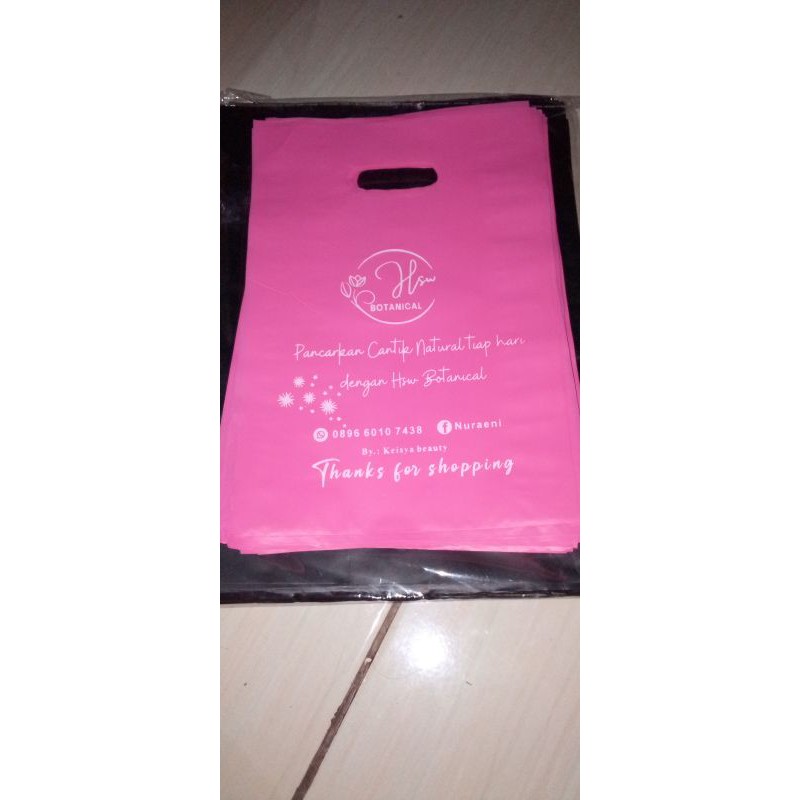 

Plastik plus sablon nama toko ukuran 30x40cm isi 200pcs