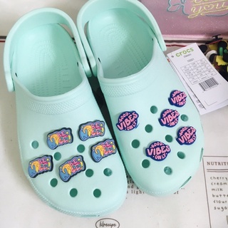 light blue crocs with jibbitz