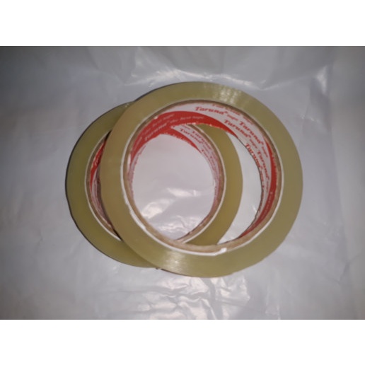 

perekat-pengikat- isolasi 1 inch x 90 yard / solatip / lakban 24mm -pengikat-perekat.