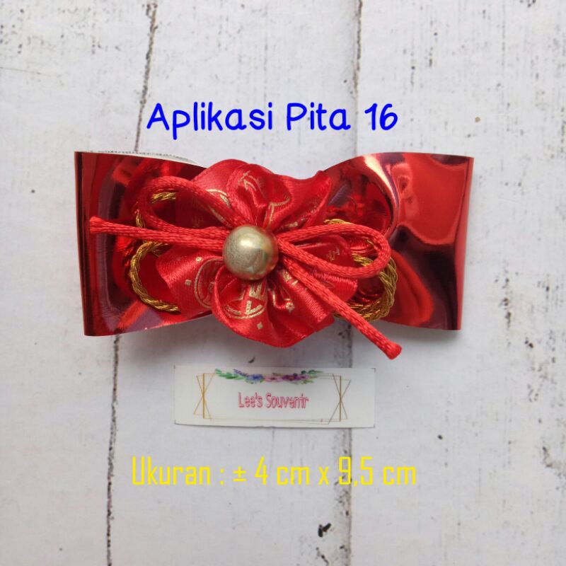 

Aplikasi Pita 16 / Pita Imlek / Pita Merah