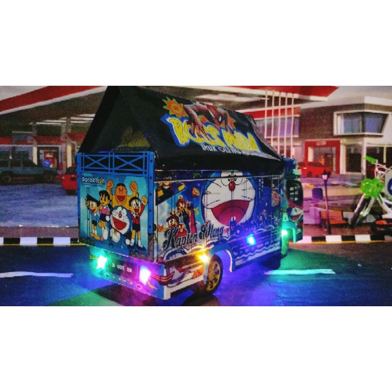 miniatur truk oleng Doraemon ukuran panjang 42cm full lampu bonus terpl