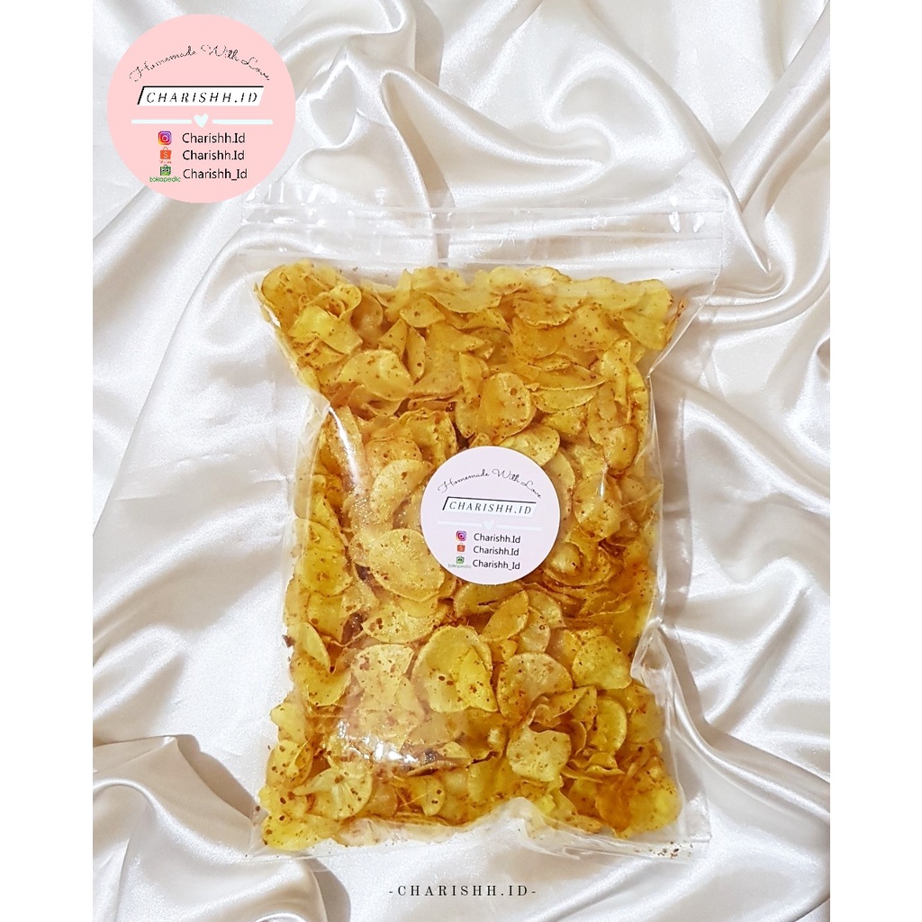 

Keripik Singkong Kunyit Pedas Asin Khas Kalbar (Cassava Chips) 500 Gram