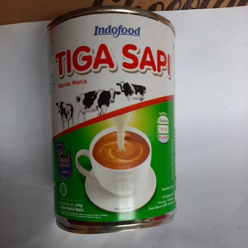 

Tiga Sapi Kental manis