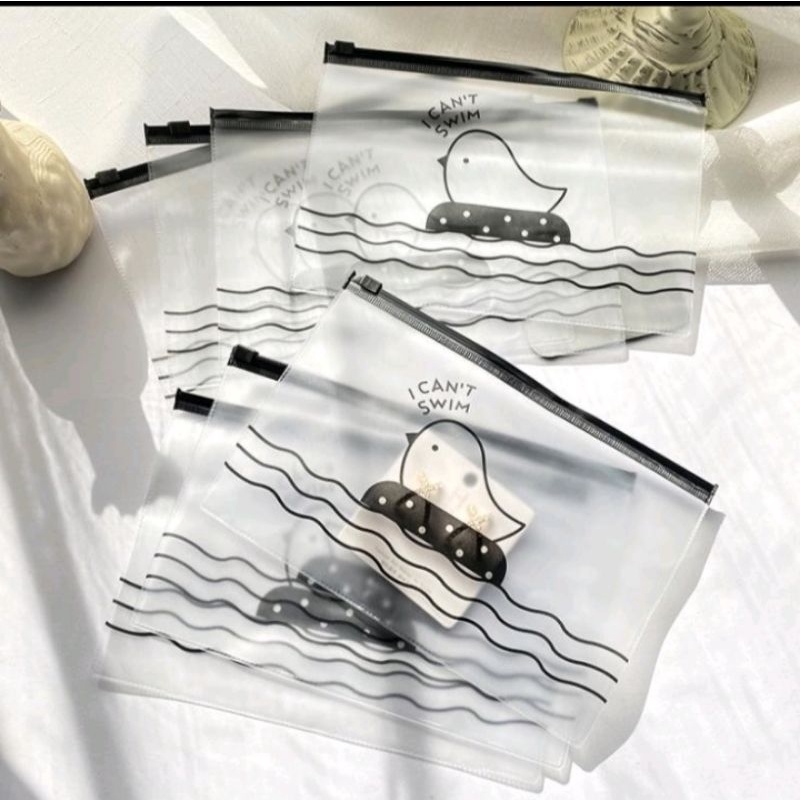 

TEMPAT PENSIL TRANSPARAN
