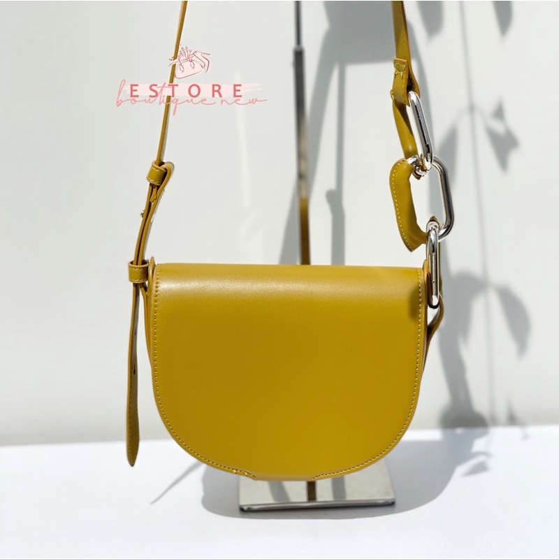 C Kora Saddle Crossbody Bag