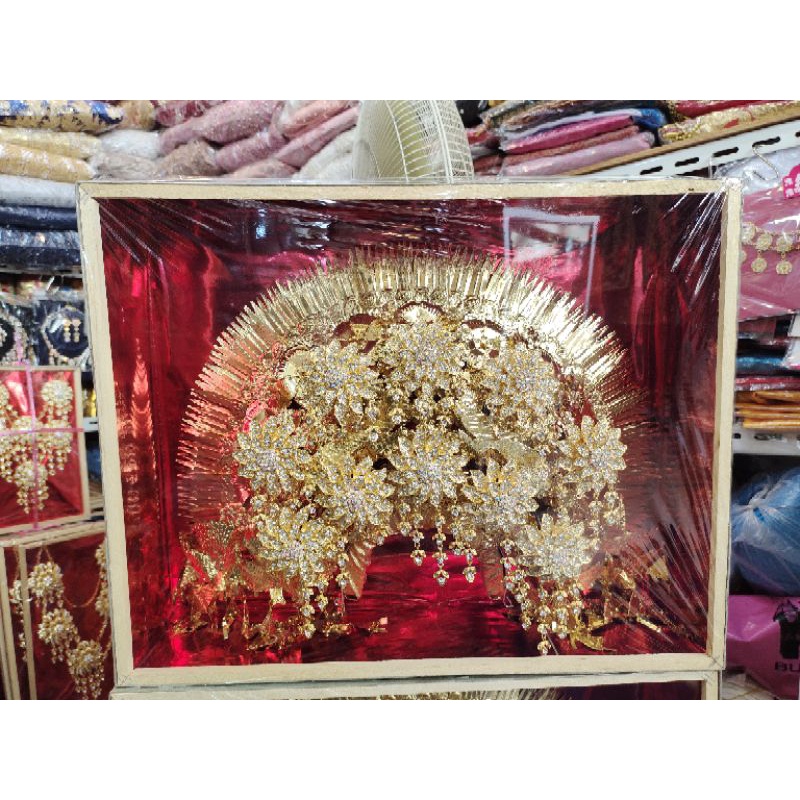 sunting Minang atau sunting Padang motif bagus.