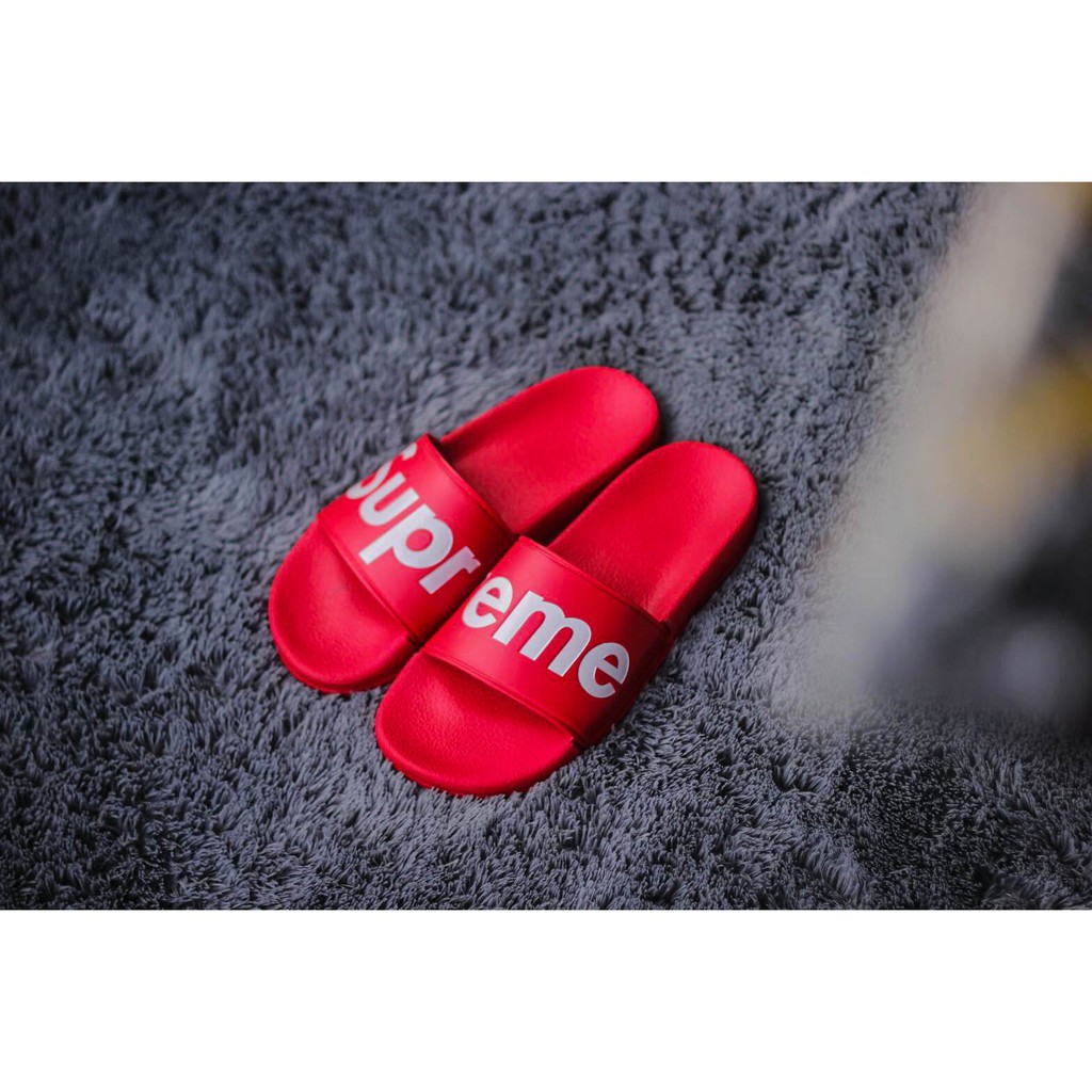 supreme red flip flops