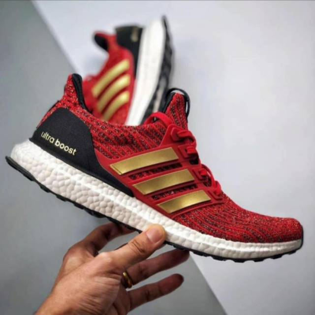 ultra boost red and gold