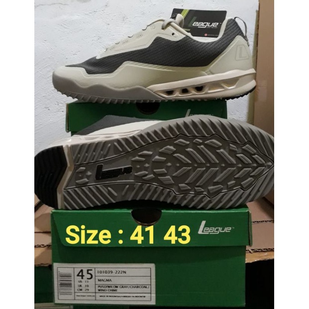 league sepatu lari pria Magma
