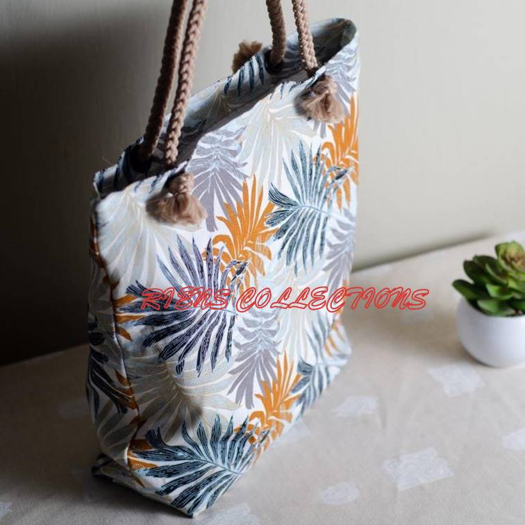 RIENS COLLECTIONS. TOTEBAG TALI SUMBU KEPANG KANVAS MOTIF FLORAL PALM ORANGE