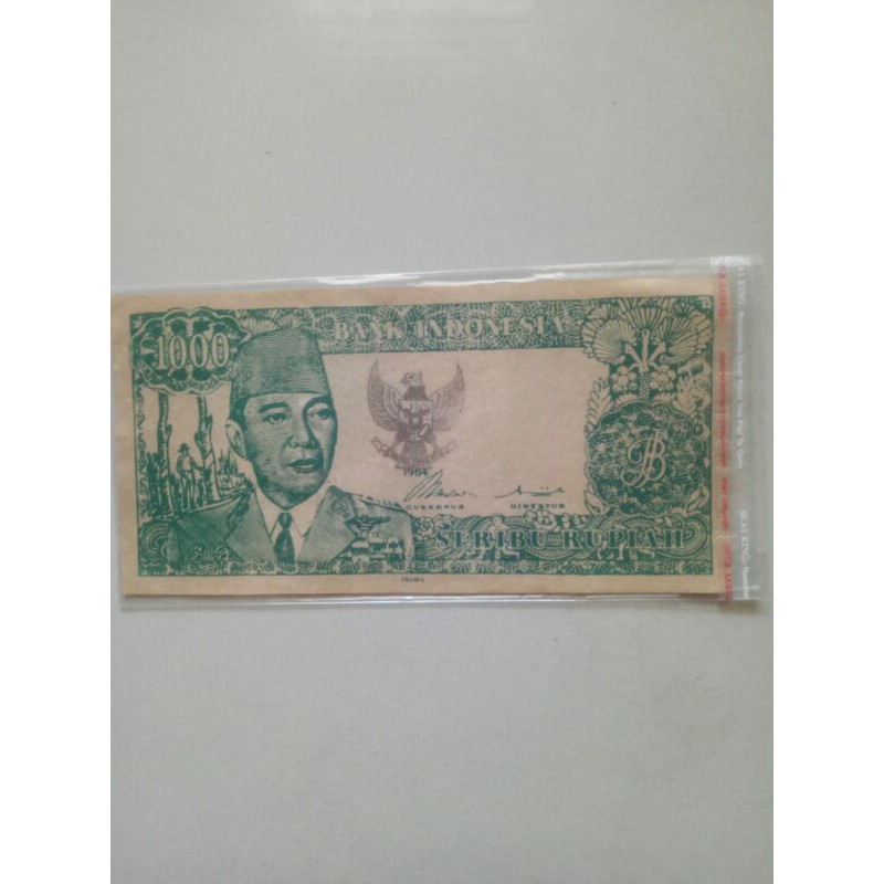 uang lawas 1000 rupiah tahun 1964 hijau (balik cewek menari 2 orang)