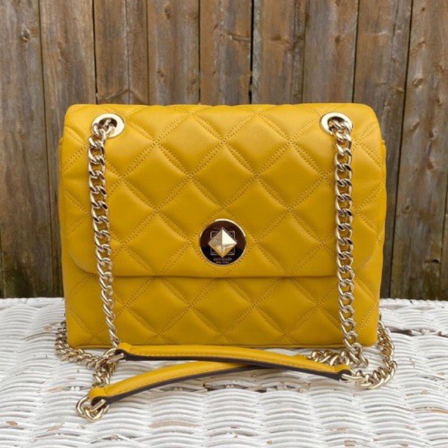 kate Spade natalia flap small golden yarrow