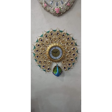 new Jam dinding keramik merak