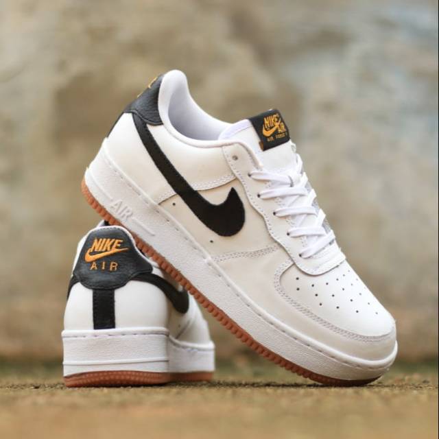 white and black air force 1 with gum sole