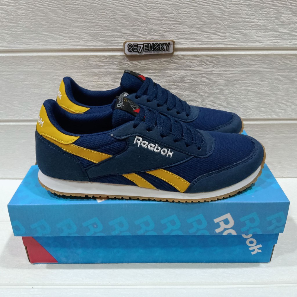 yellow classic reeboks