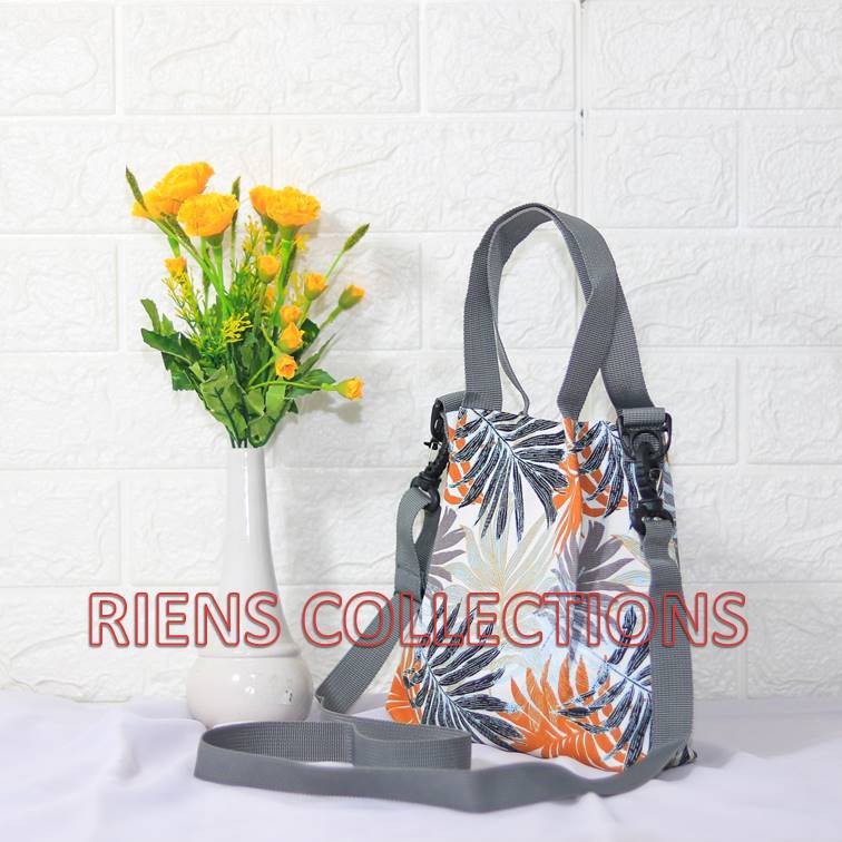 RIENS COLLECTIONS. SLING BAG TAS SELEMPANG KANVAS MOTIF  FLORAL PALM ORANGE. Tas Jogja Tas Kanvas Tas Souvenir Jogja