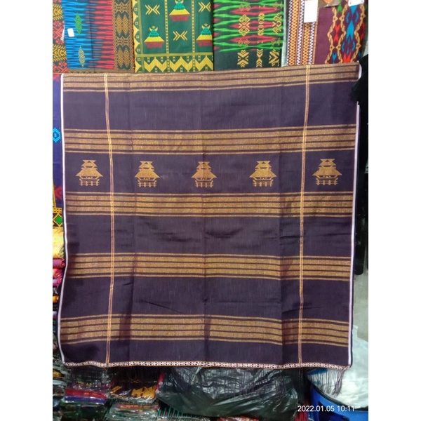 TudungSutraRumahAdatKaro