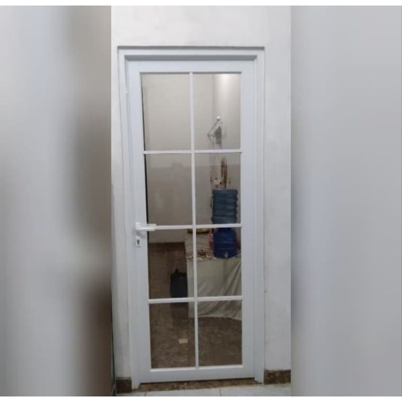 pintu alumunium dan list ornamen T.220