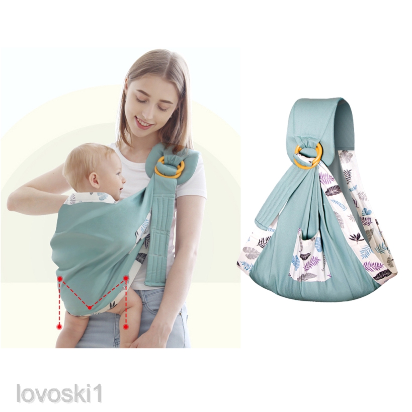 nursing newborn in wrap
