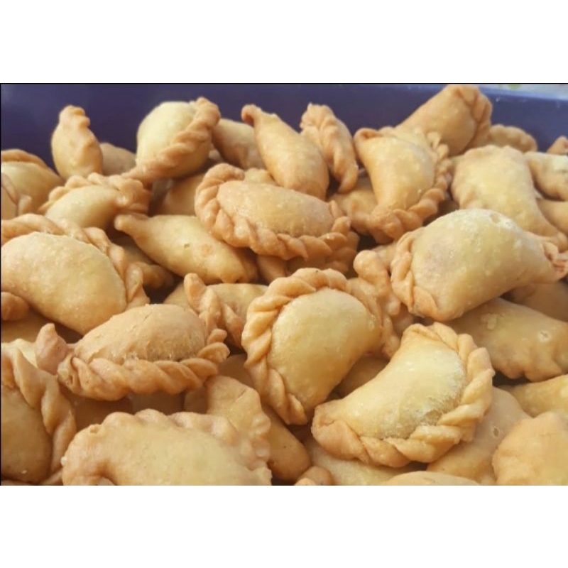 

Cemilan kue kering pastel mini isi abon tersedia kemasan 250gr dan 500gr