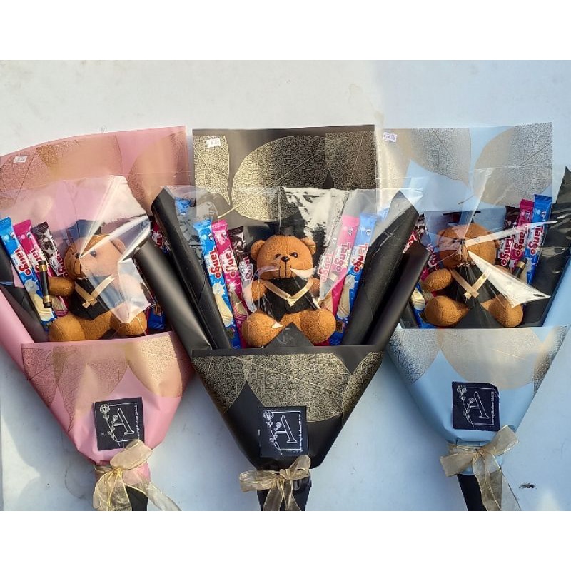 

Buket Snack dan boneka sedang wisuda