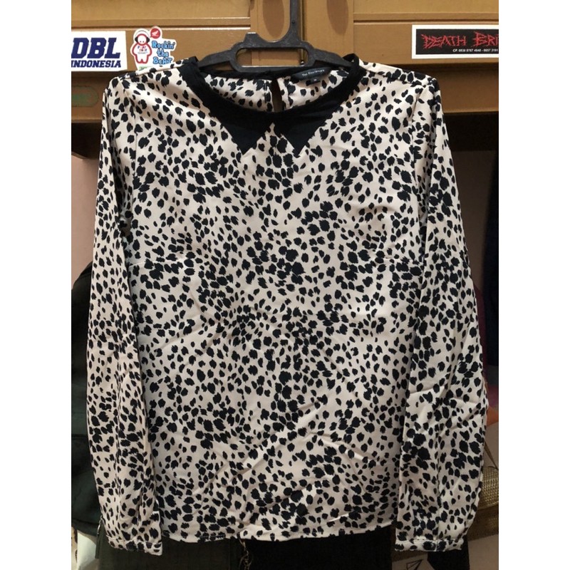Blouse motif leopard branded