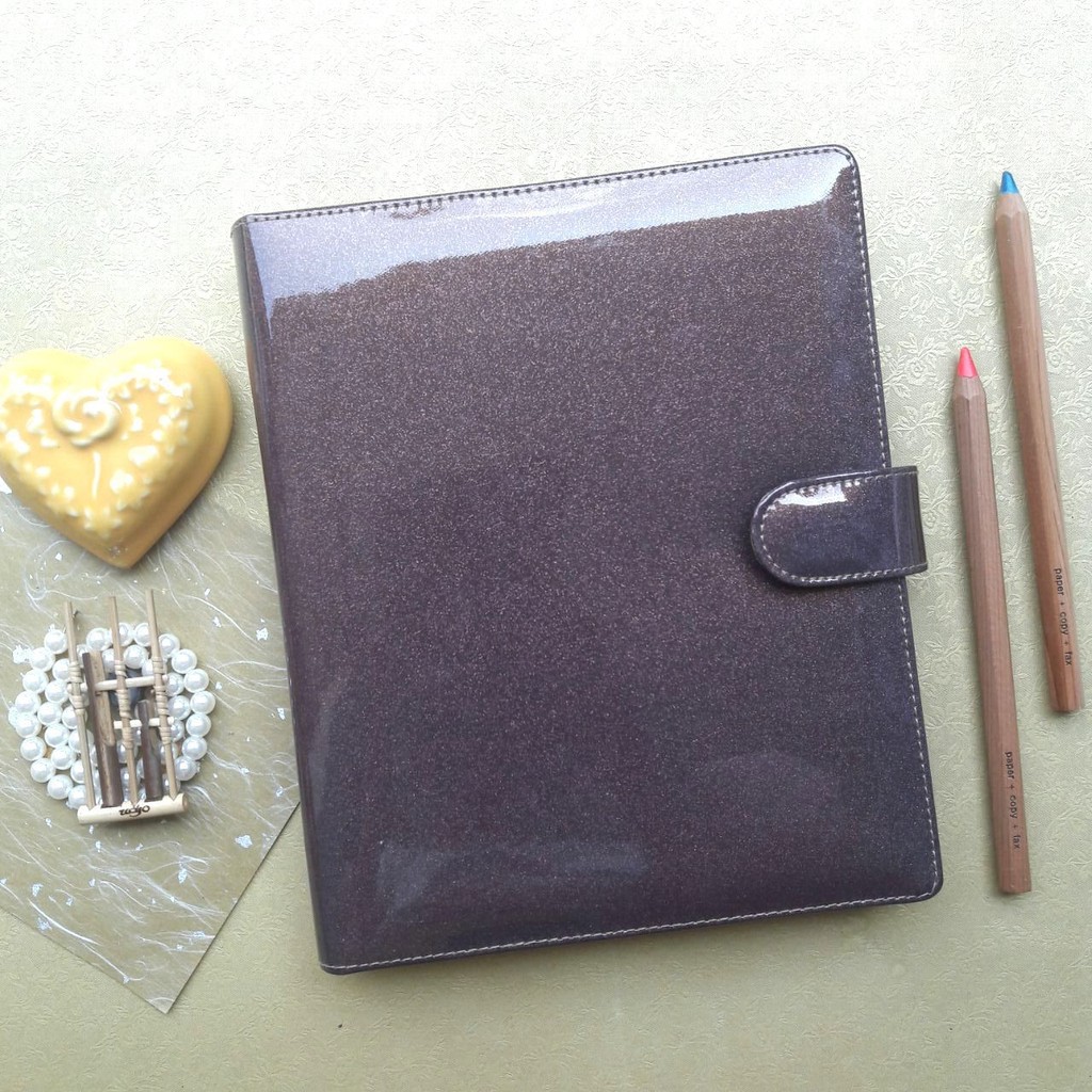 

Binder Glitter Glossy Bronze A5 20 ring - Cokelat Tua