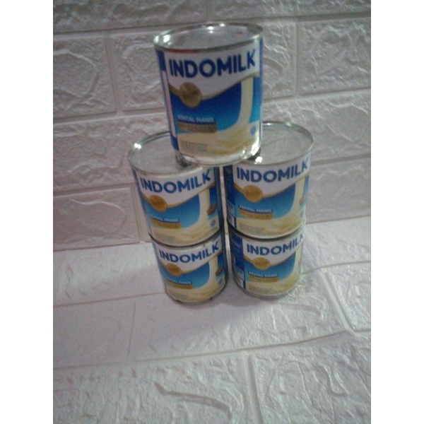 

SUSU KENTAL MANIS KALENG INDOMILK/SUSU INDOMILK