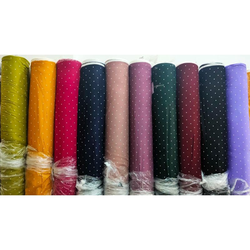 bahan rayon viscose motif polkadot .menerima jasa jahit berbagai macam  jenis baju homamade.mukena s