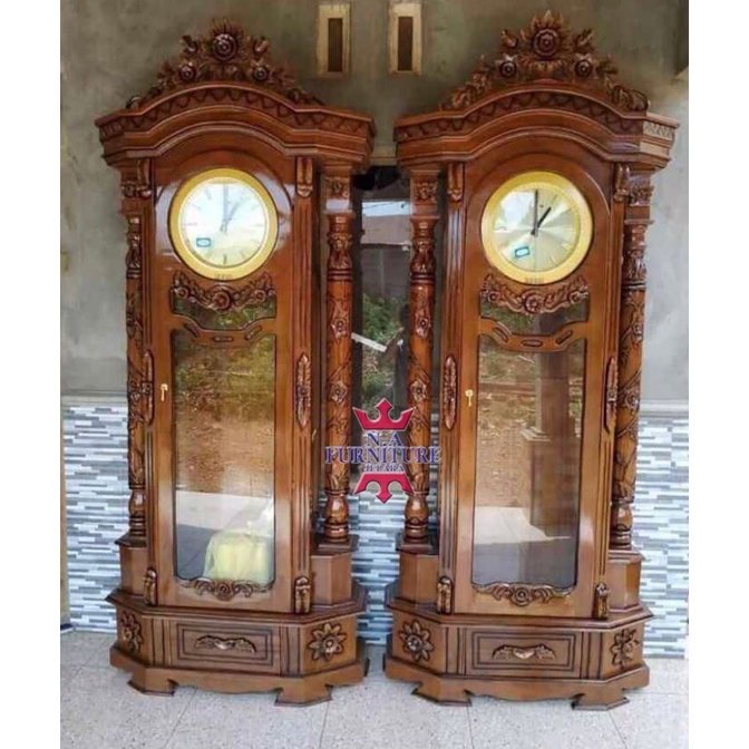lemari jam hias kayu jati, lemari pajangan jati,lemari jam pajangan