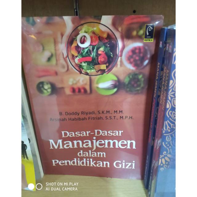 Buku dasar-dasar manajemen dalam pendidikan gizi