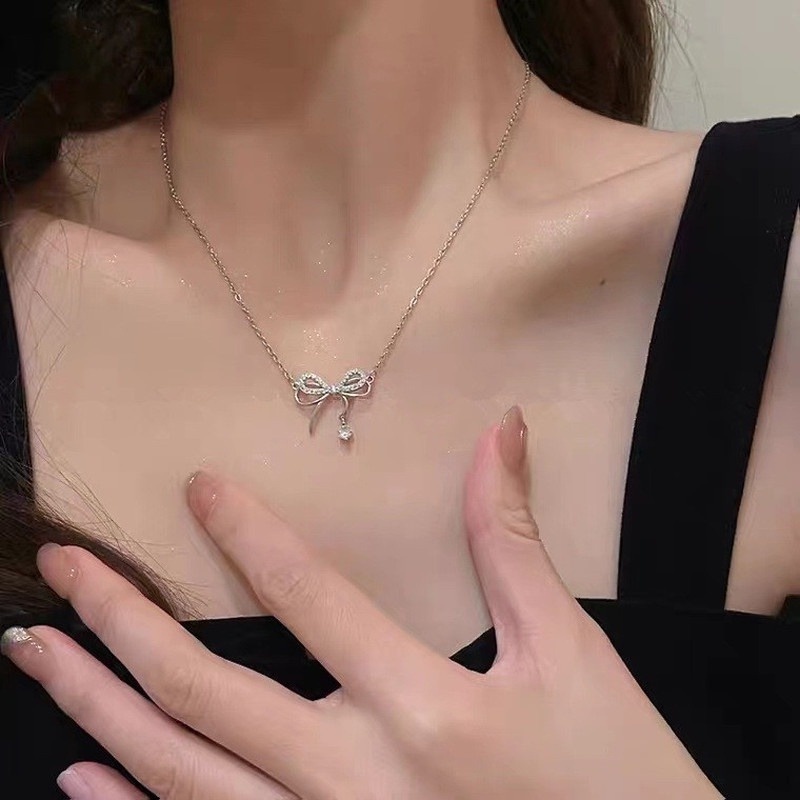 Roselife Kalung Choker Gaya Korea Liontin Pita Hias Kristal CZ Untuk Wanita