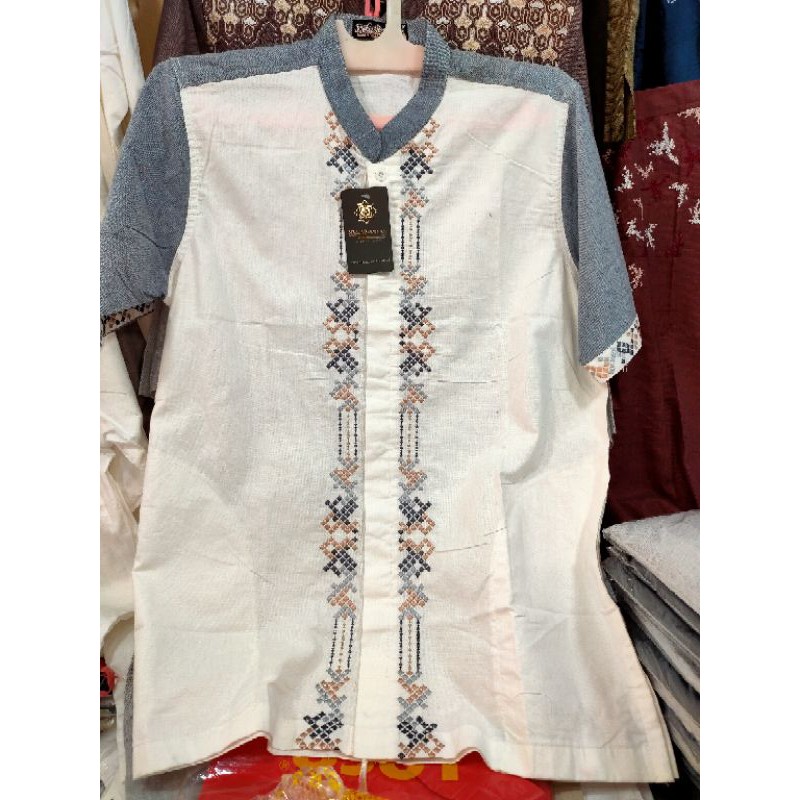 Baju Koko pria lengan pendek merk Syfa Rahman