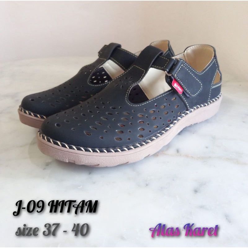 Sepatu flat J09 kickers laser