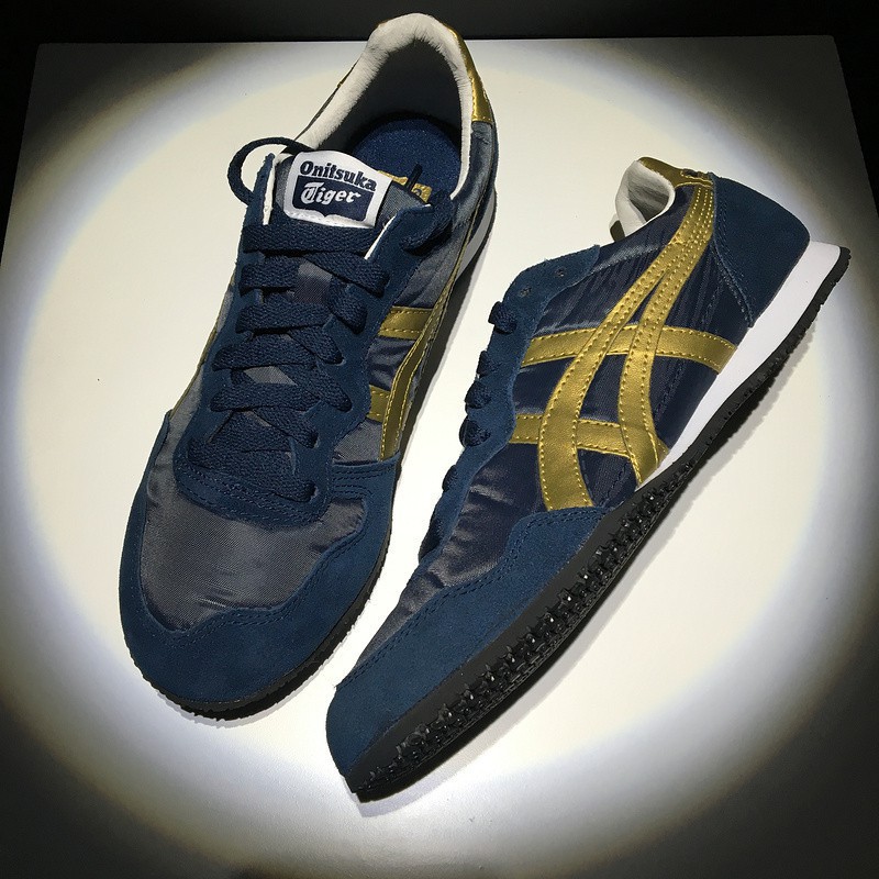 navy blue and gold shoes