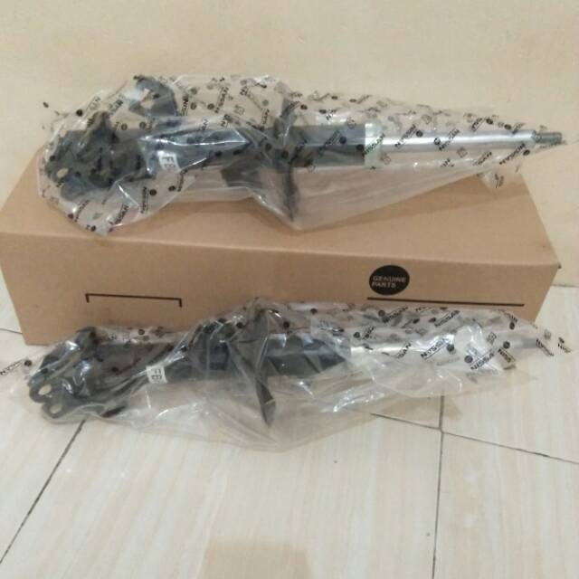 Shock breaker grand livina depan original