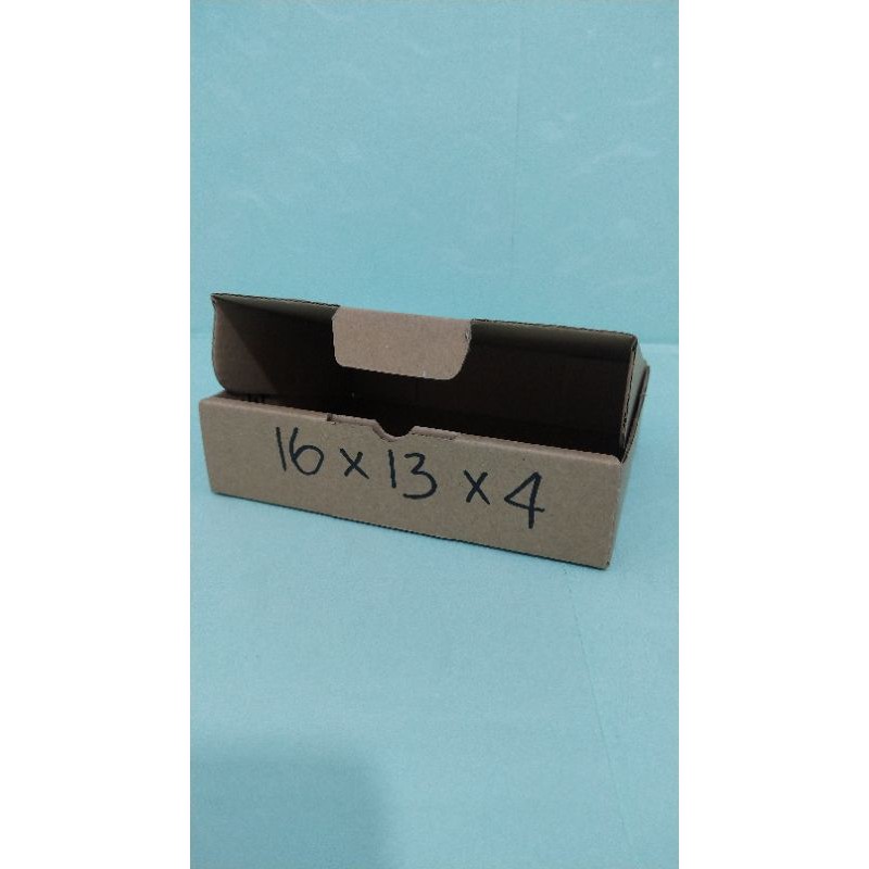 

kardus packing die cut ukuran 16x13x4